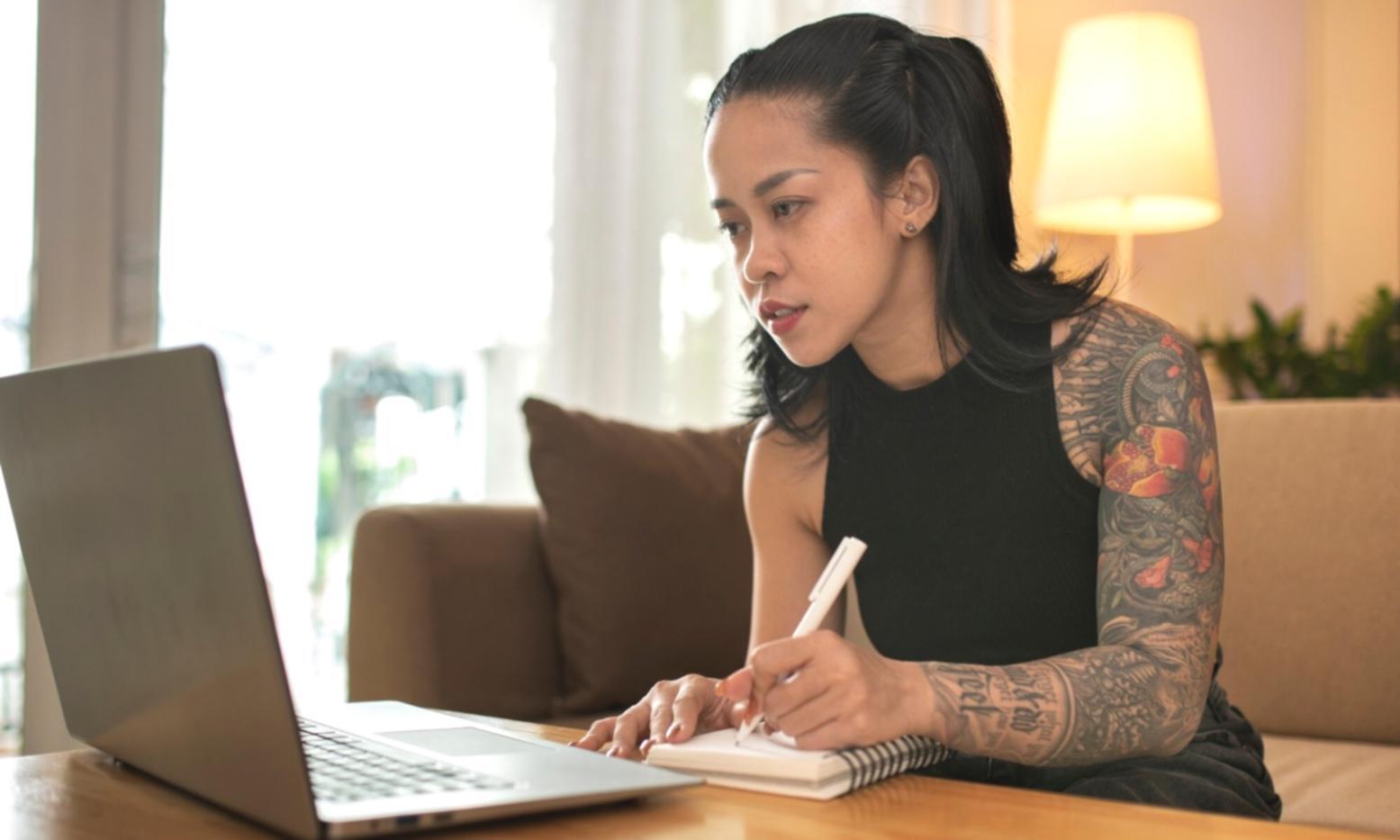 Professional team member reviewing financial analysis data on multiple screens