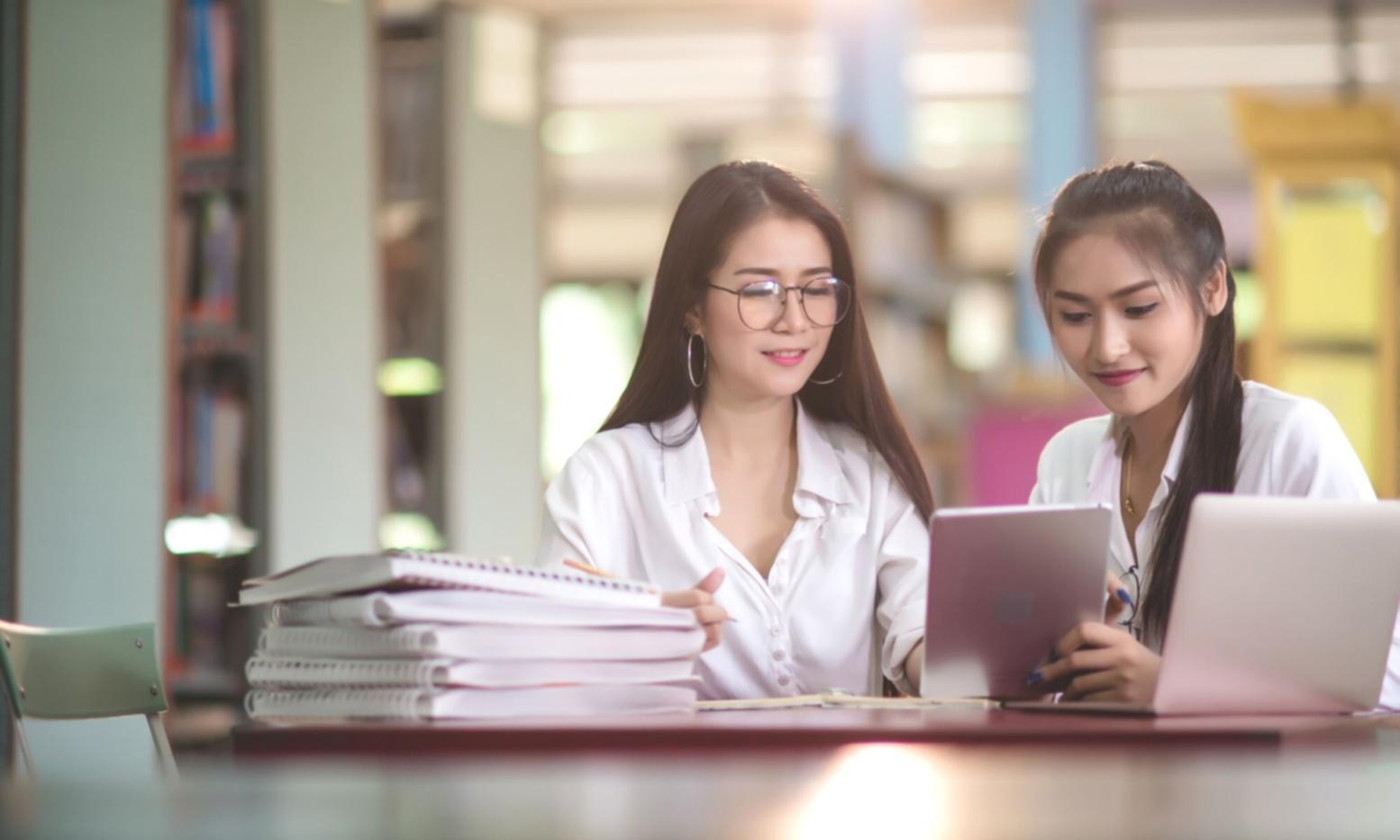 Team reviewing company research and market analysis